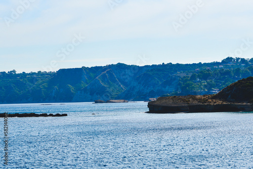 Sea and beach scenery, blue sky with clouds.