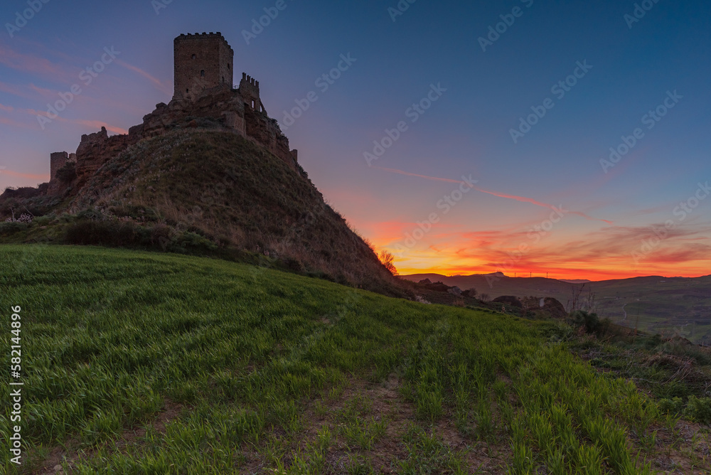 Panoramic view of Cefalà Diana Castle at dusk, province of Palermo IT	
