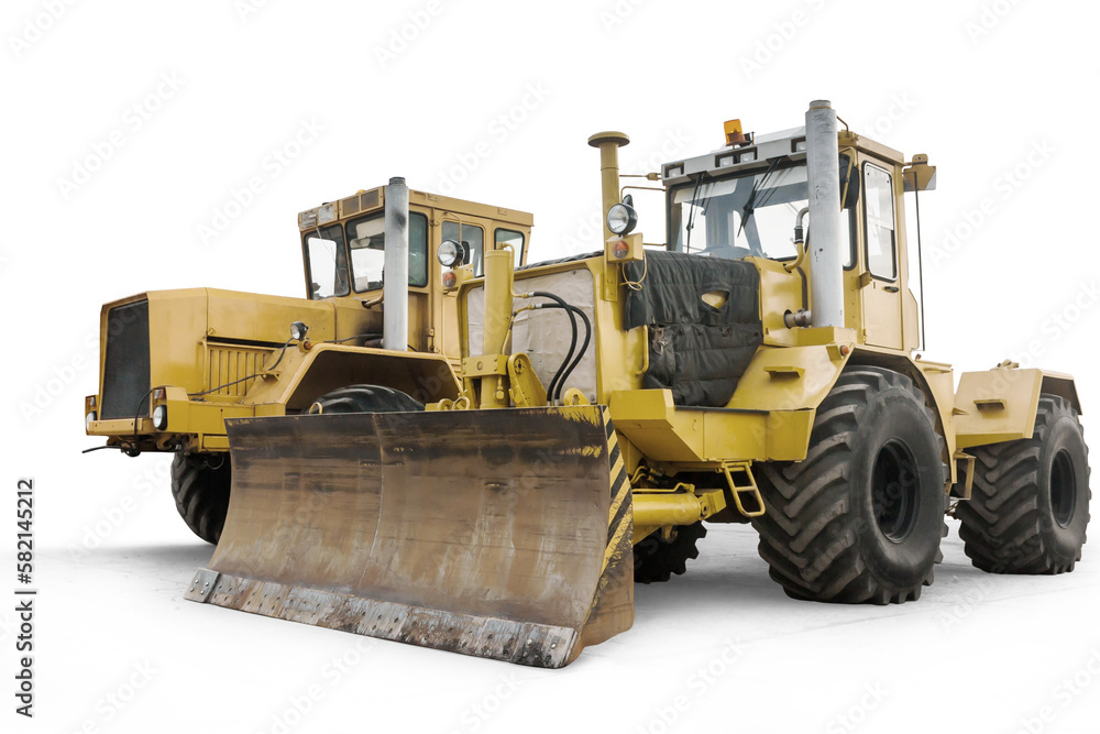 Fototapeta premium Two yellow heavy wheeled tractors isolated on transparent background