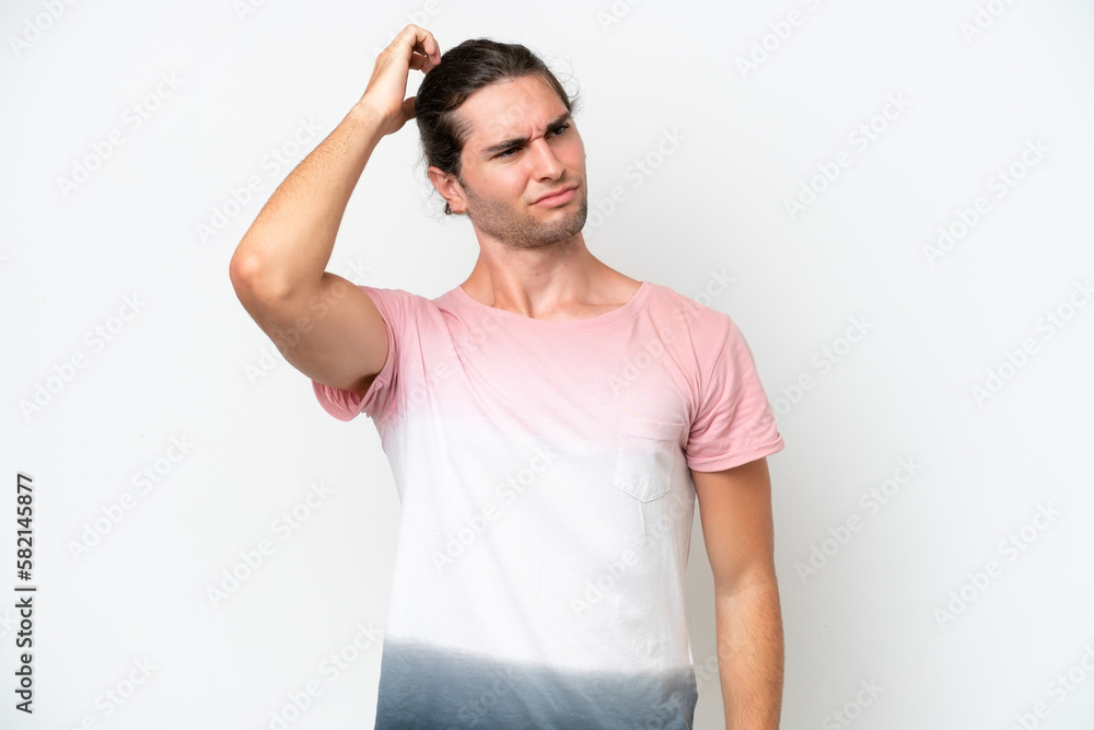 Caucasian handsome man isolated on white background having doubts while scratching head Caucasian handsome man isolated on white background having doubts while scratching head