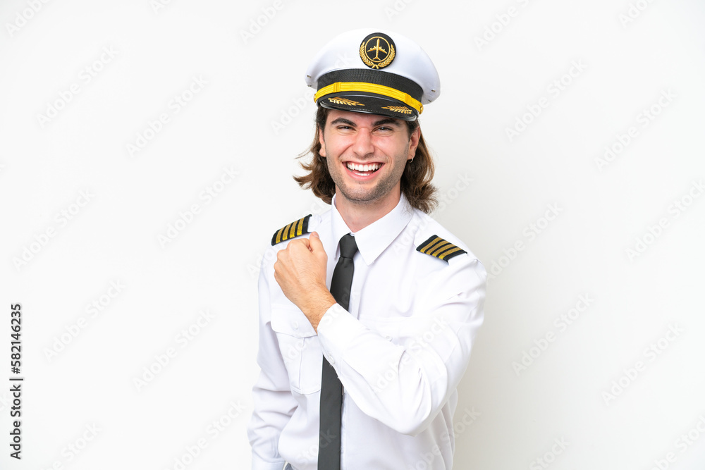 handsome Airplane pilot isolated on white background celebrating a victory handsome Airplane pilot isolated on white background celebrating a victory