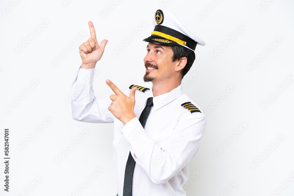 Airplane caucasian pilot isolated on white background pointing with the index finger a great idea Airplane caucasian pilot isolated on white background pointing with the index finger a great idea