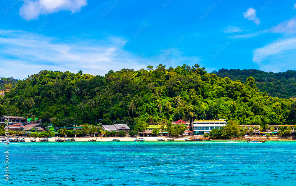 Koh Phi Phi Don Thailand island beach lagoon limestone rocks.