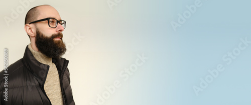 Quadro em tela close-up male face, young pensive bearded and mustachioed man, satisfied guy wit