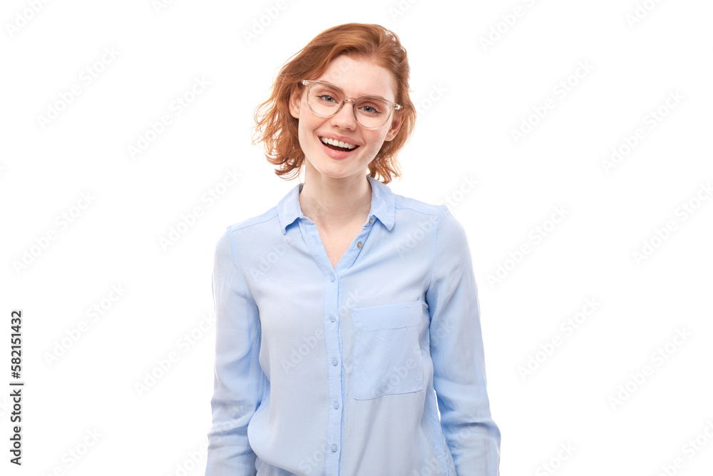 Portrait of attractive red-haired girl in business shirt and glasses smiling joyfully isolated on white studio background. Portrait of attractive red-haired girl in business shirt and glasses smiling joyfully isolated on white studio background.