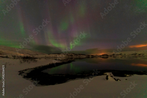 aurora borealis northern lights in karvik town of tromso  norway