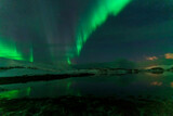 aurora borealis northern lights in karvik town of tromso, norway