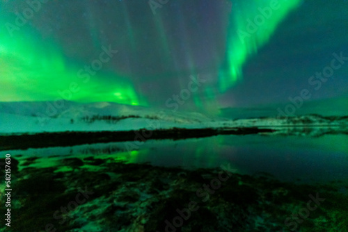 aurora borealis northern lights in karvik town of tromso  norway