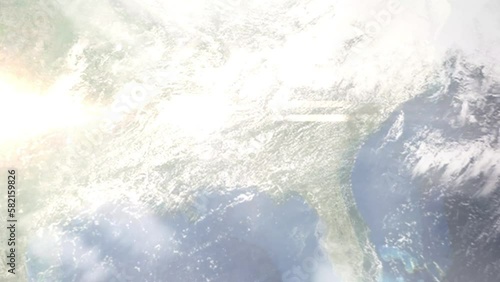 Earth zoom in from outer space to city. Zooming on Prattville, Alabama, USA. The animation continues by zoom out through clouds and atmosphere into space. Images from NASA photo