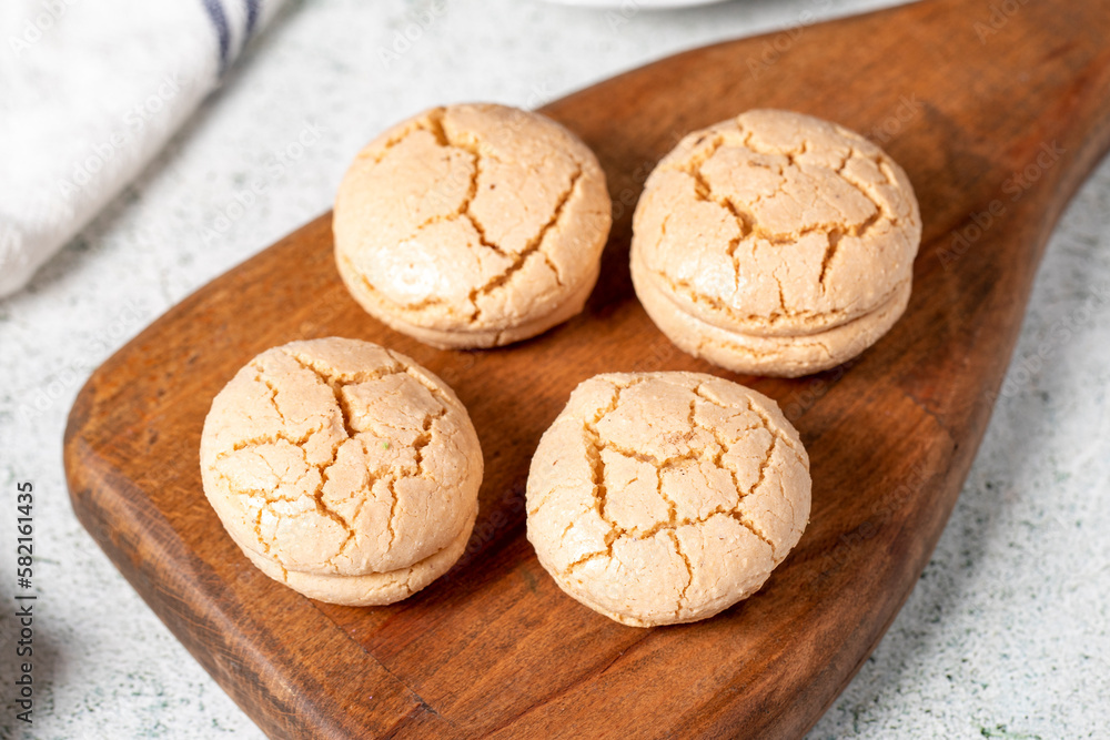 Almond cookies. Cookies made with almond flour on a stone background. Local name acibadem kurabiye. Patisserie sweets Almond cookies. Cookies made with almond flour on a stone background. Local name acibadem kurabiye. Patisserie sweets