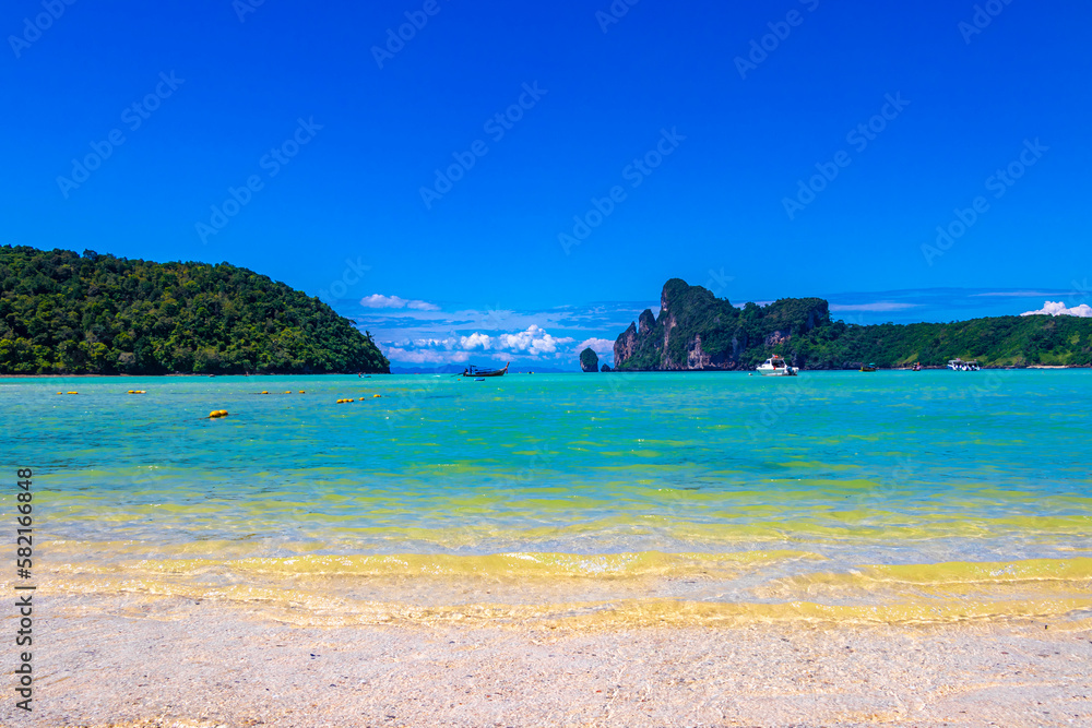 Koh Phi Phi Don Thailand island beach lagoon limestone rocks.
