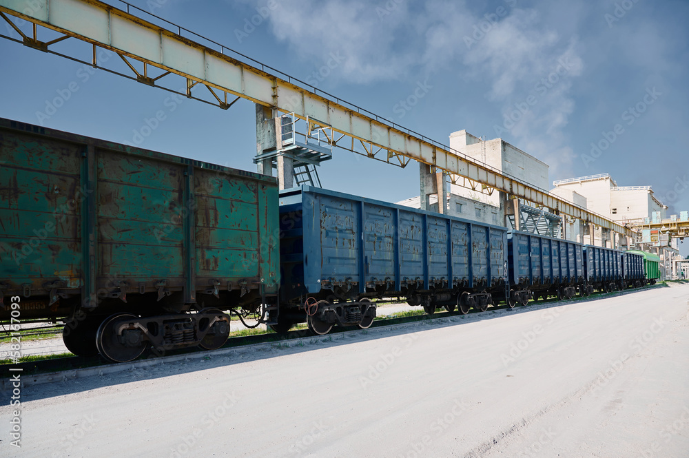 Freight cars on sidings of manufacturing silicate plant