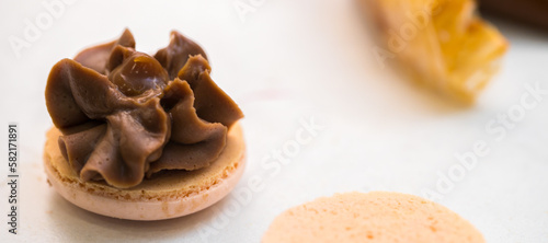 beautiful macarons cookies on the table. home bakery concept.