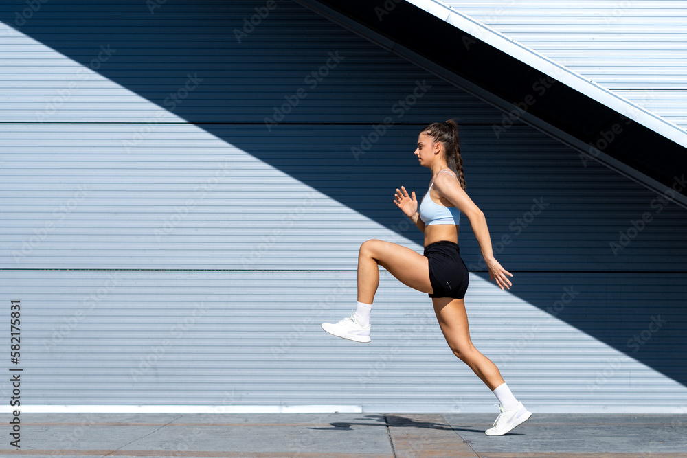 Lovely girl exercising her legs