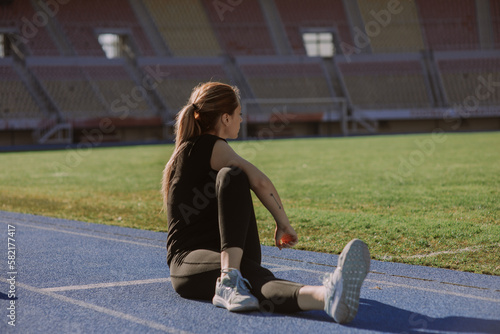 Sports girl at the stadium © qunica.com