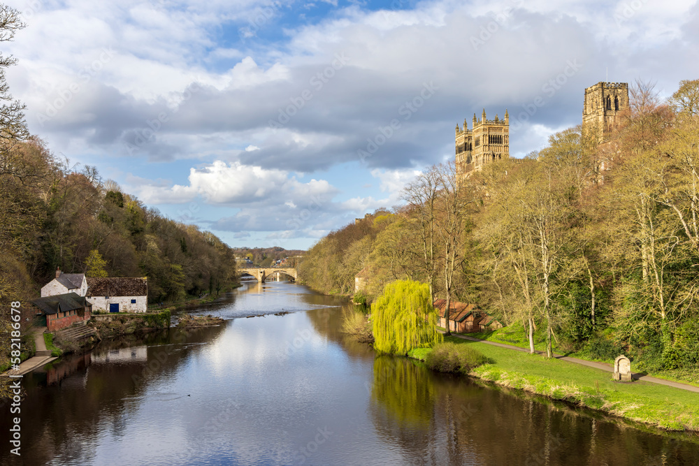 The River Wear with the magnificent Durham Cathedral on the right in the city of Durham. Taken on a bright spring day. The River Wear with the magnificent Durham Cathedral on the right in the city of Durham. Taken on a bright spring day.