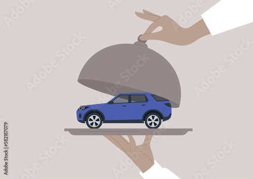 A SUV car being served on a tray with a cloche, a gift concept