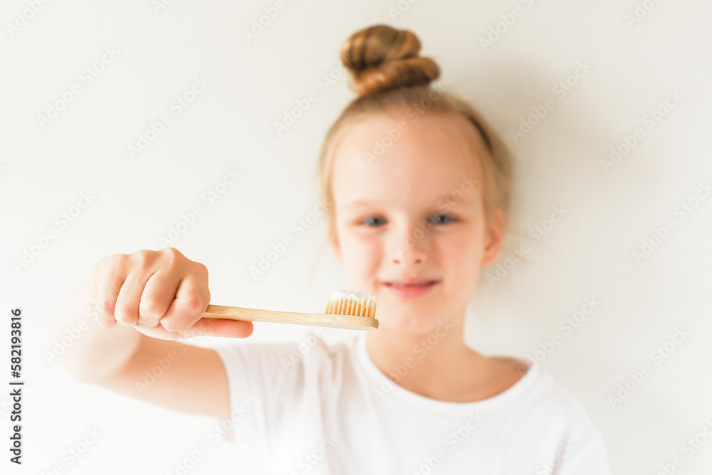Happy Little Girl Brushing Her Teeth, Eco Wooden Organic Toothbrush, Dental Hygiene, Morning Night Healthy Concept Lifestyle Happy Little Girl Brushing Her Teeth, Eco Wooden Organic Toothbrush, Dental Hygiene, Morning Night Healthy Concept Lifestyle