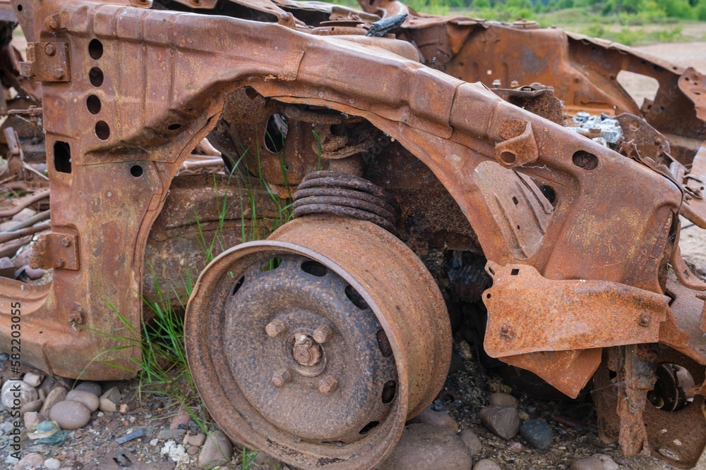 Close-up shot of an old rustic abandoned vehicle Close-up shot of an old rustic abandoned vehicle