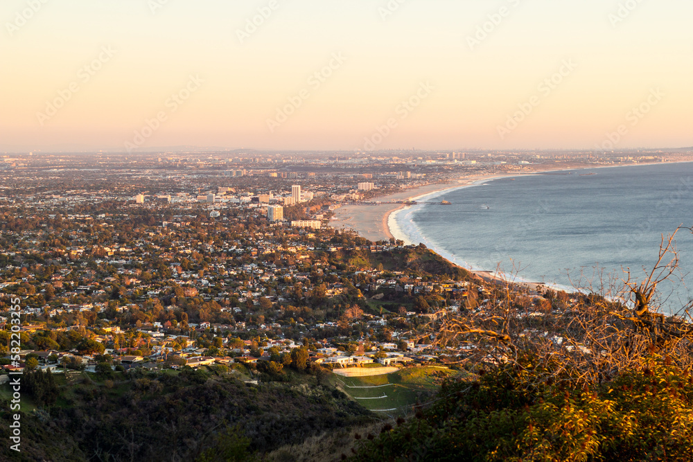 Fototapeta premium Overlooking the Santa Monica bay and beach neighborhoods of Los Angeles from above in the Santa Monica Mountains.