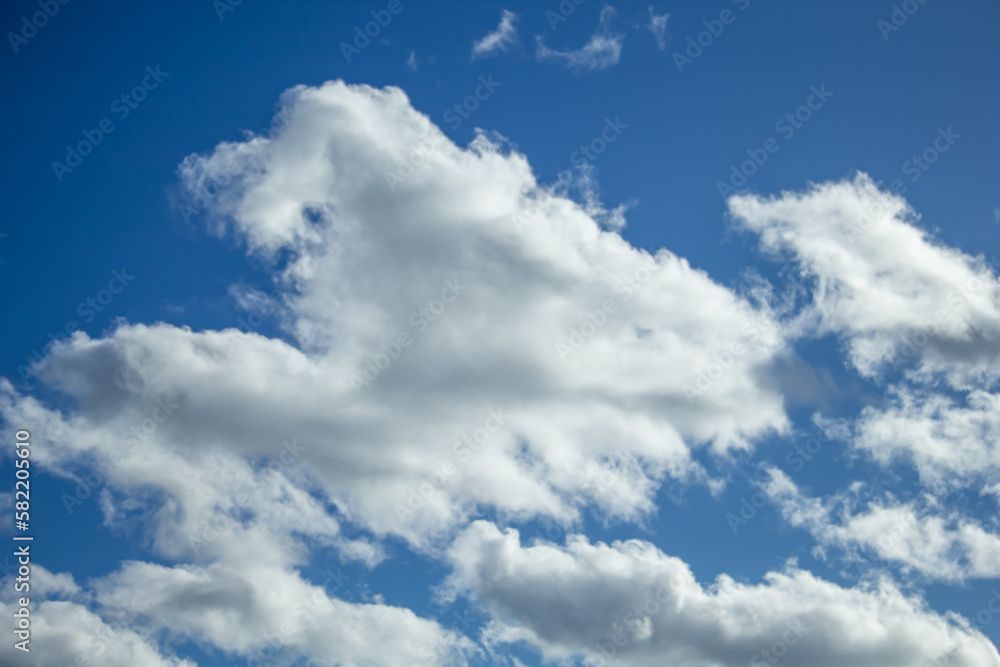 Naklejka premium Blue sky with white clouds