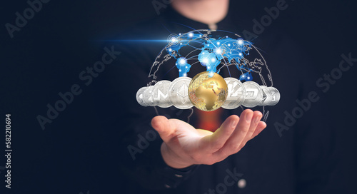 Man holding in hand symbol of crypto currency - electronic virtual money for web banking and international network payment.Cryptocurrency gold bitcoin coin virtual reality. Banner