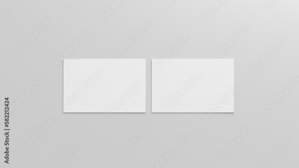 Business card mockup. Pair of business card on white background. View directly above Business card mockup. Pair of business card on white background. View directly above