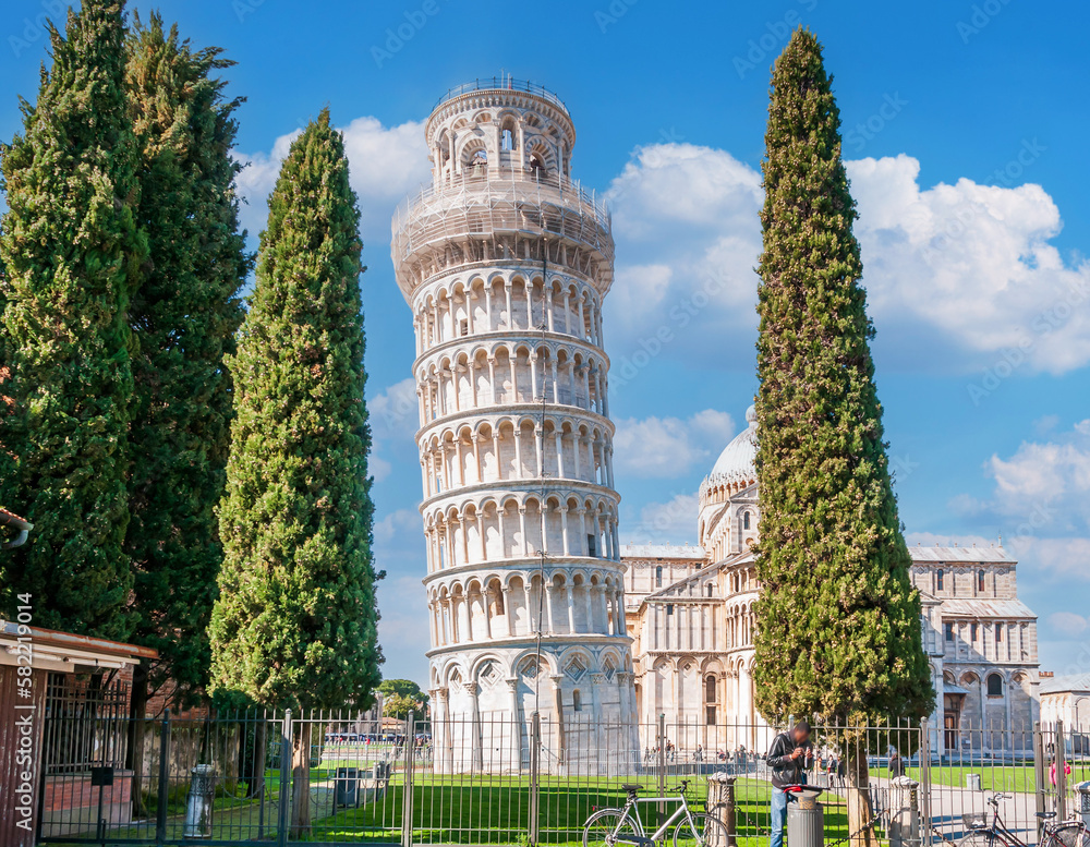 Panorama of the Cathedral of Our Lady of the Assumption and its leaning campanile made famous around the world in Pisa, Tuscany, Italy