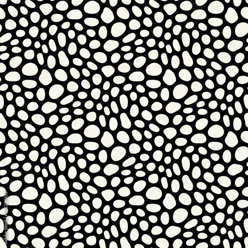 Vector seamless pattern. Abstract spotty texture. Natural monochrome design. Creative background with rounded spots. Decorative organic swatch.