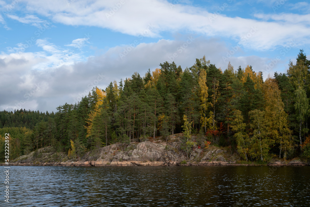 Lake Ladoga near the village Lumivaara on a sunny autumn day, Ladoga skerries, Republic of Karelia, Russia Lake Ladoga near the village Lumivaara on a sunny autumn day, Ladoga skerries, Republic of Karelia, Russia