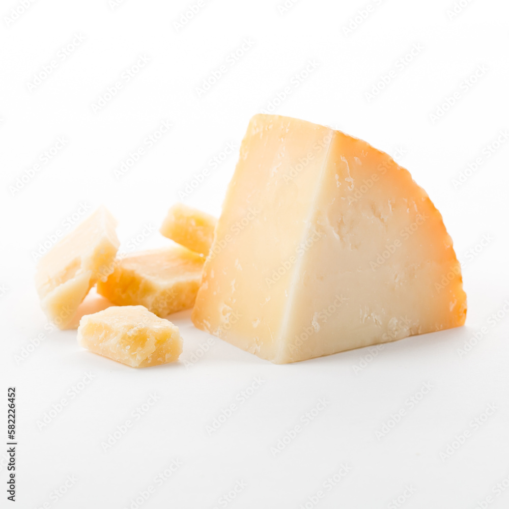Food concept. Side view photo of slice parmesan cheese isolated on