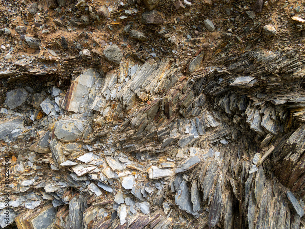 Rock layers pattern. Stone background, natural rock formation. Layered rock formations on a background. Rock layers pattern. Stone background, natural rock formation. Layered rock formations on a background.