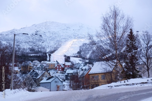 The Norwegian port city of Narvik in winter scenery. Traditional buildings of city.