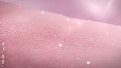 3d animation and rendering bubble vitamin drop to skin to refresh anti aging beauty pink skin.Ultra violet from sun shine to skin in the background.