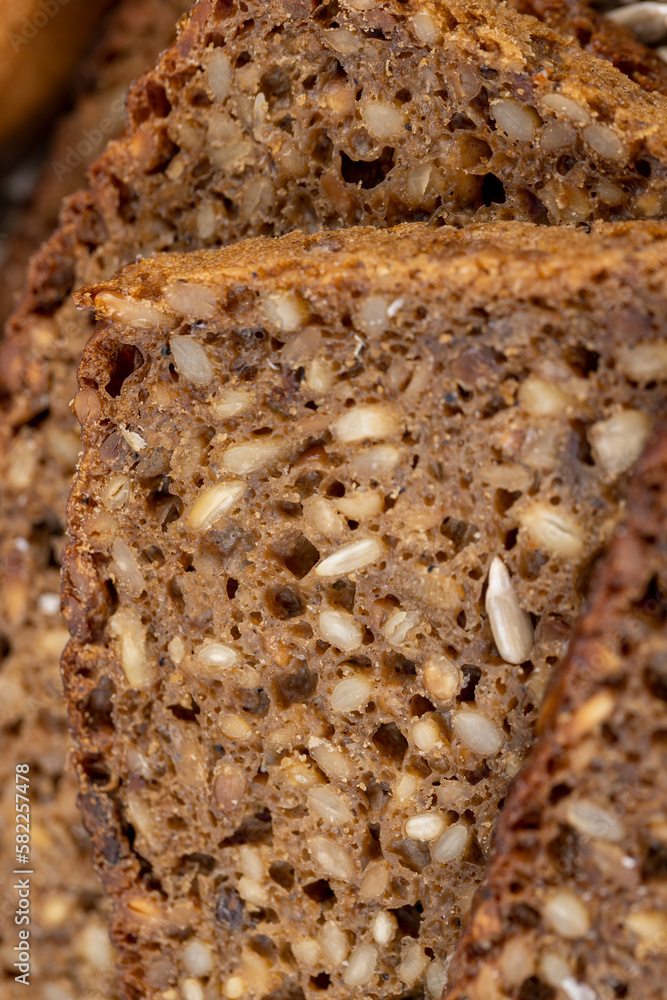 Black rye bread cut into chunks with sunflower seeds Black rye bread cut into chunks with sunflower seeds
