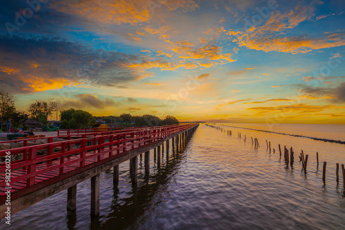 Sea coast and wooden bridge View of wooden bridges and coastline at sunrise Wooden bridge at the sea at sunset