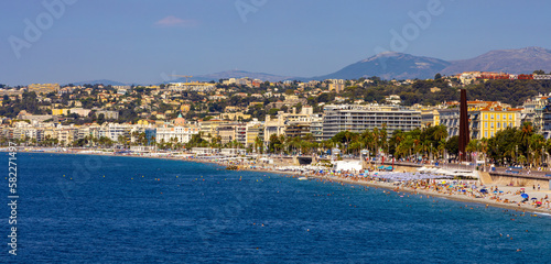 Fototapeta Naklejka Na Ścianę i Meble -  Nice shore and beach panorama with Prom des Anglais boulevard, Le Carre d’Or and Les Baumettes district on Mediterranean Sea shore on French Riviera in France