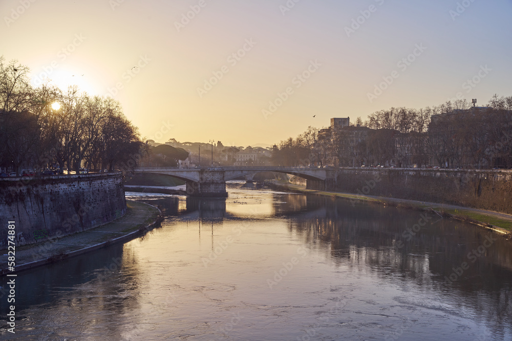 Early morning view of river Tiber and Ponte Garibaldi bridge in Rome, Italy Early morning view of river Tiber and Ponte Garibaldi bridge in Rome, Italy