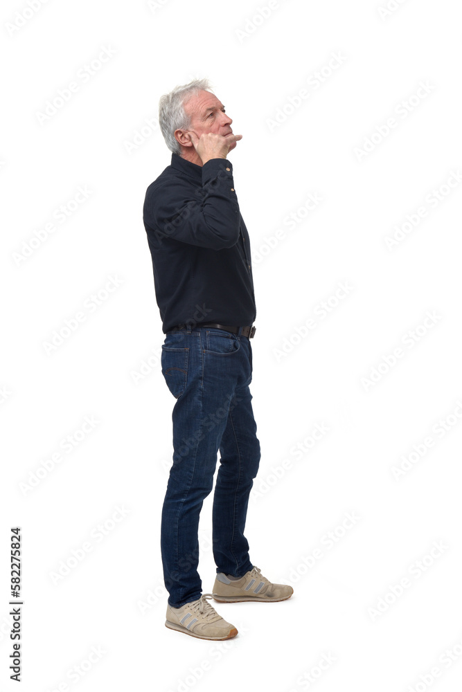 man making phone gesture with his hands and looking up white background man making phone gesture with his hands and looking up white background