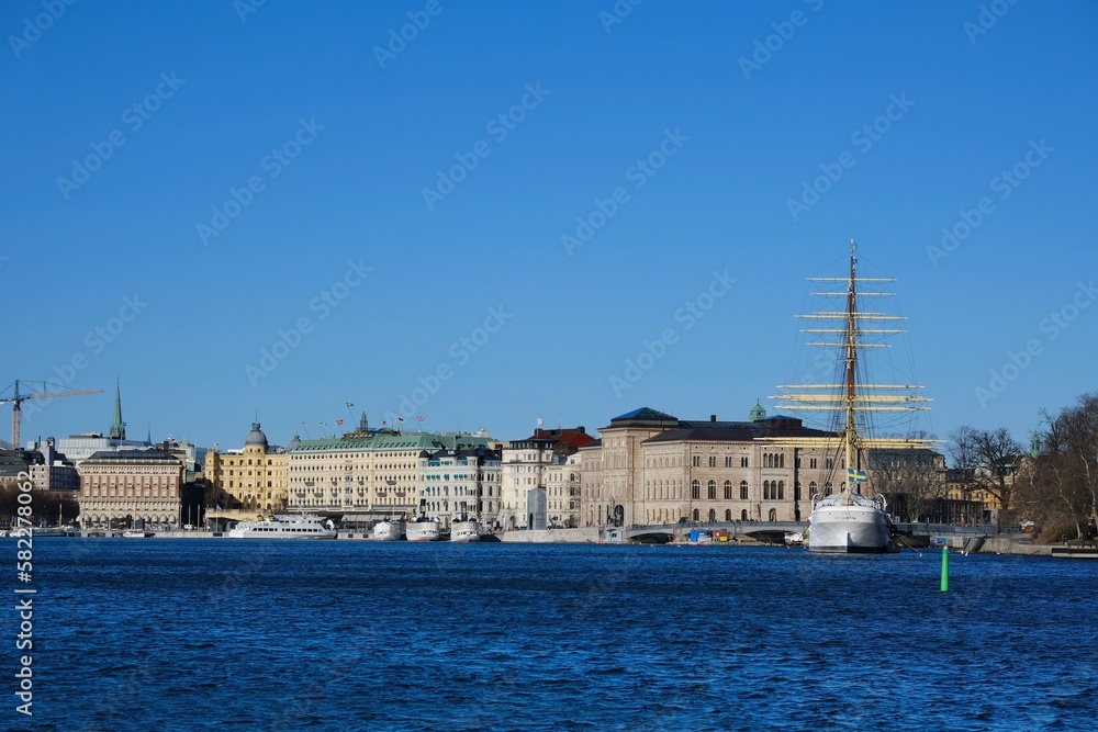 The sailing ship is moored on the west shore of the islet Skeppsholmen in central Stockholm, Sweden,	
