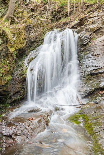 Fototapeta Naklejka Na Ścianę i Meble -  Waterfall in the forest with silk effect