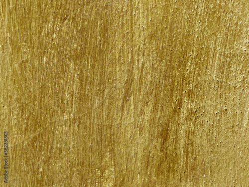 cement wall texture painted in golden color