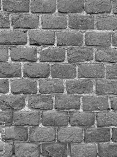 black and white photo of brick wall