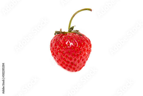 Obraz na płótnie Fresh ripe strawberries with ponytail isolated on white background. Beautiful and tasty strawberries. Dessert. Close-up w salonie