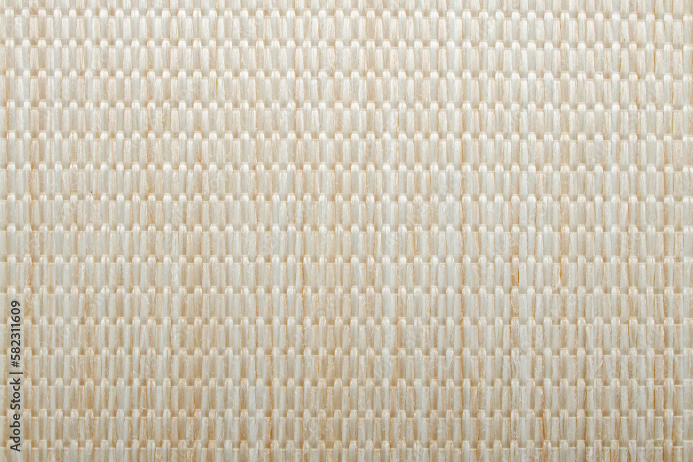 Beige fabric background. A chunky textured fabric with a pattern Beige fabric background. A chunky textured fabric with a pattern