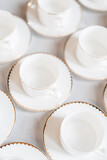 english high tea with empty white teacups aerial view
