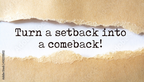 Turn a setback into a comeback. Words written under torn paper. Motivation concept text.