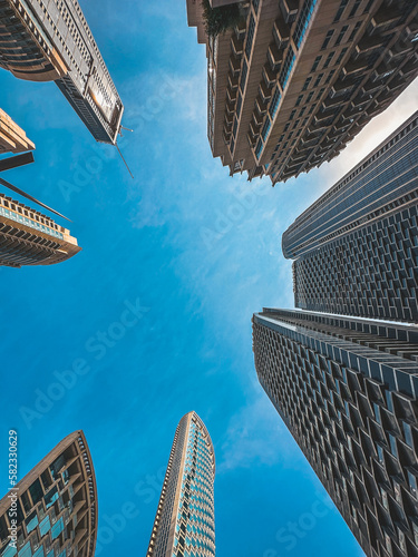 Photography Below Skyscrapers view in Downtown Dubai, business and finance district, UAE