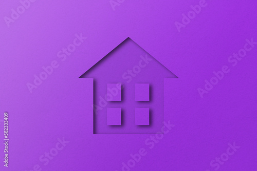 Purple paper cut out house shape isolated on purple paper background.