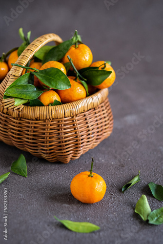 jeruk santang madu (Citrus sinensis) on dark background. often consumed during Chinese new year photo